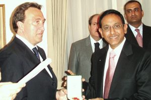 Being conferred knighthood by Italian Minister